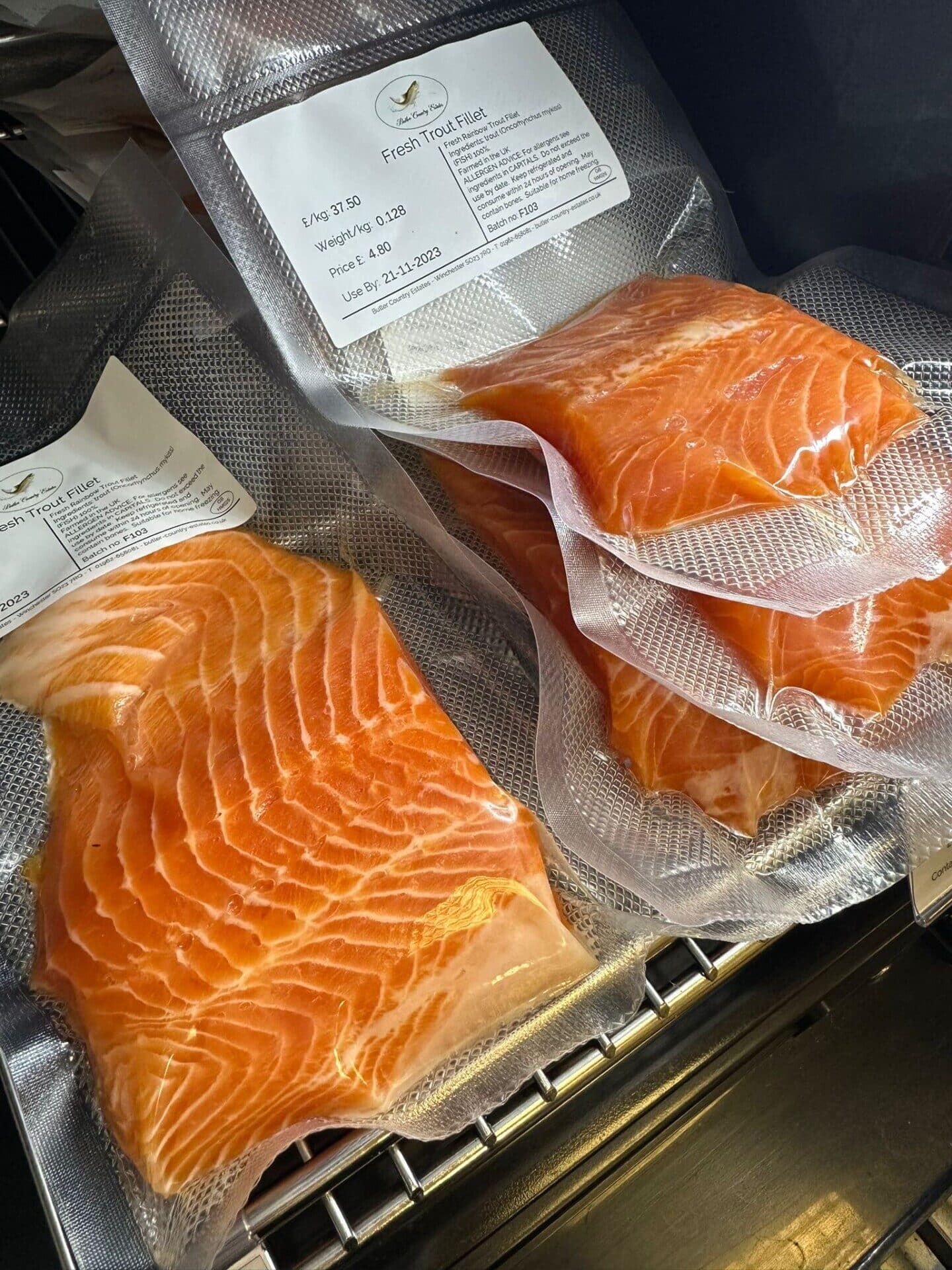 fresh trout fillets for sale in a shop